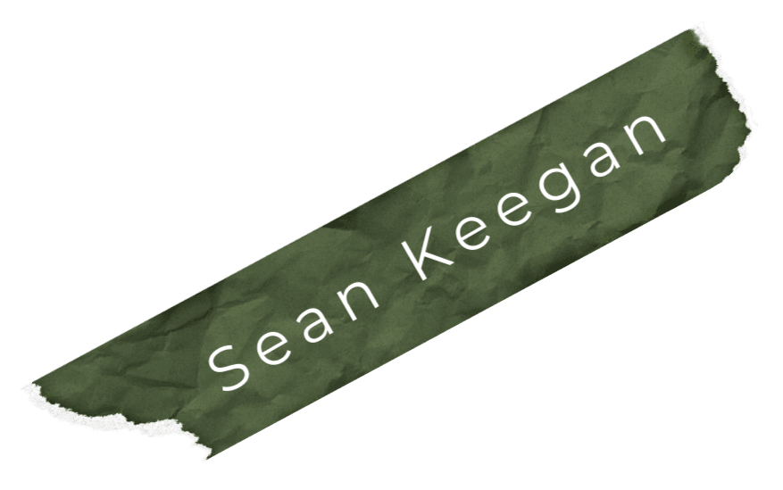 an image of a ripped piece of green tape with sean keegan written on it, the owner of site